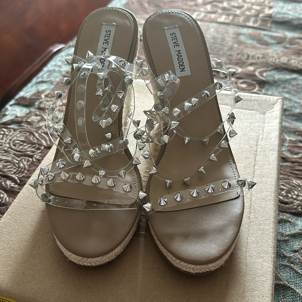 Steve Madden clear wedge sandal.